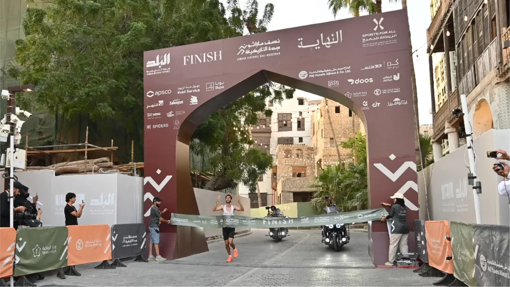 Anouar El Ghouz crossing the finish line at the Jeddah Historic Half Marathon