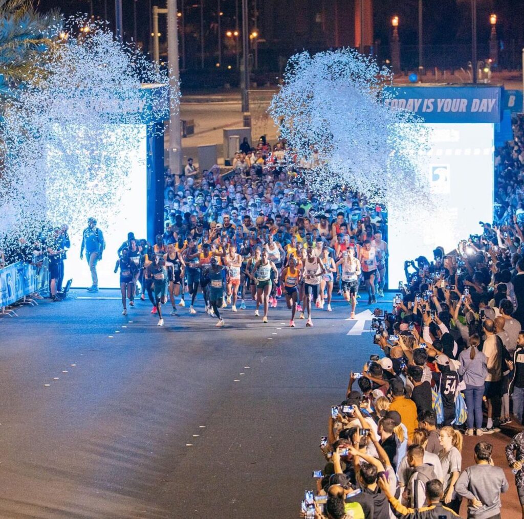 Participants in the ADNOC Abu Dhabi Marathon beginning the race