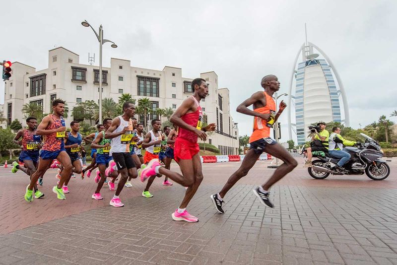 Individuals racing in the Dubai Marathon