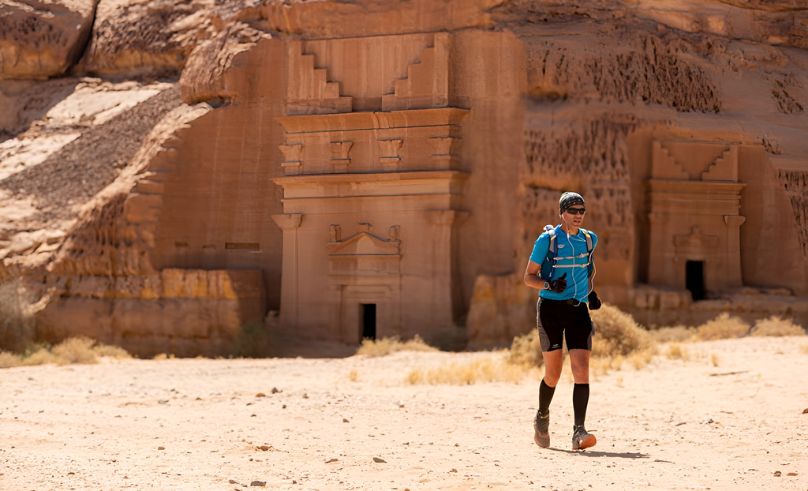 A runner with the AlUla Desert Blaze beautiful Scenery 