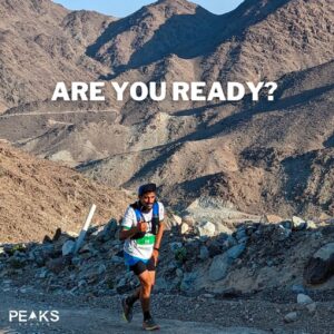 A man running with a quote saying "are you ready?" in G.O.A.T Ultra Trail Race