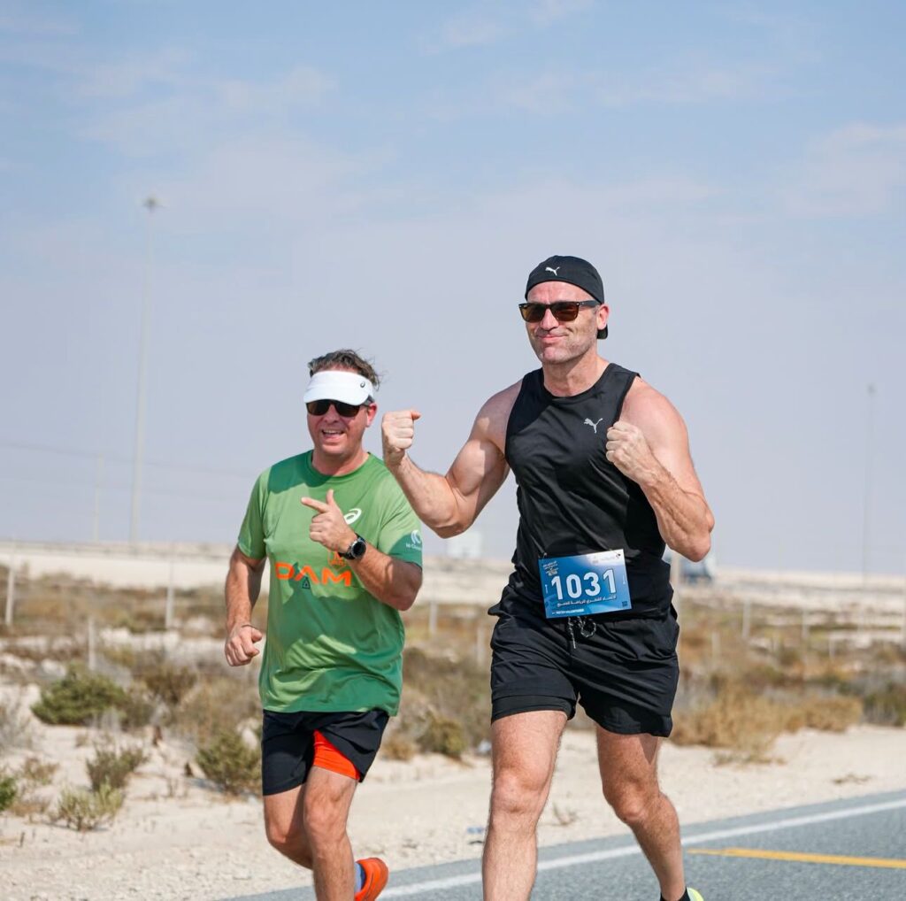 Participants running at the Qatar East to West Ultramarathon 2024